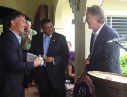 Cruzan Rum CEO and President Gary Nelthropp (right) presents Beam Global Spirits President Matt Shattock (left) and Gov. John deJongh Jr. with gold cufflinks memorializing Thursday's groundbreaking.